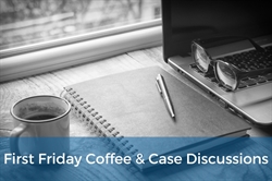 [ai] A coffee cup next to a notebook and a pen on a wooden table, with a laptop and a pair of glasses in the background. A banner at the bottom reads 'First Friday Coffee & Case Discussions'.